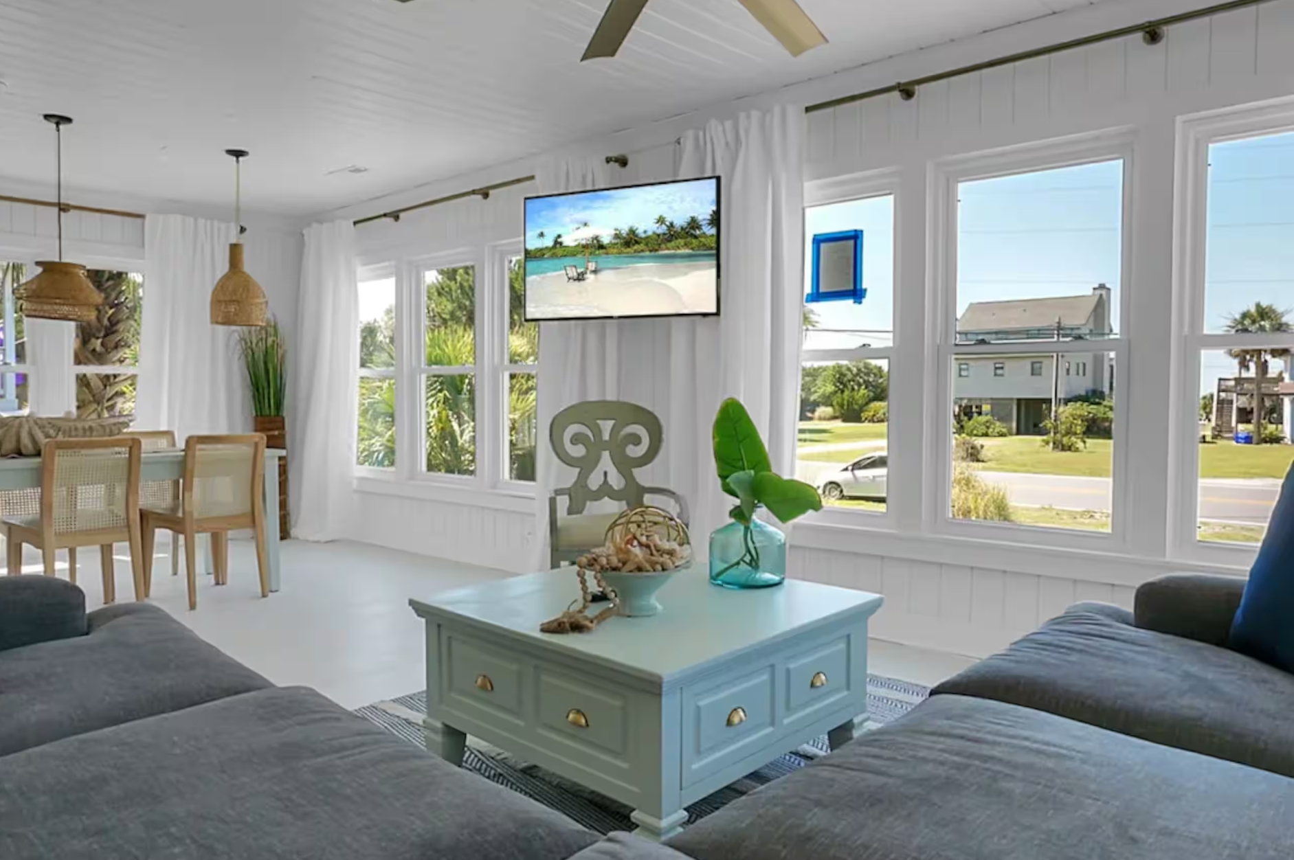Light-filled living room at The Blue Anchor, with a linen sofa and coastal textures.